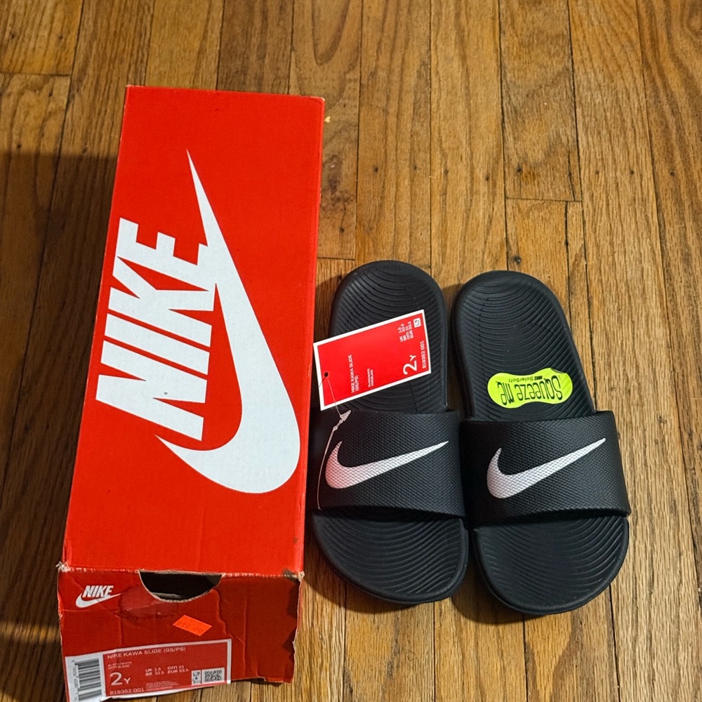 Nike Kids Black Slide Sandals with White Swoosh